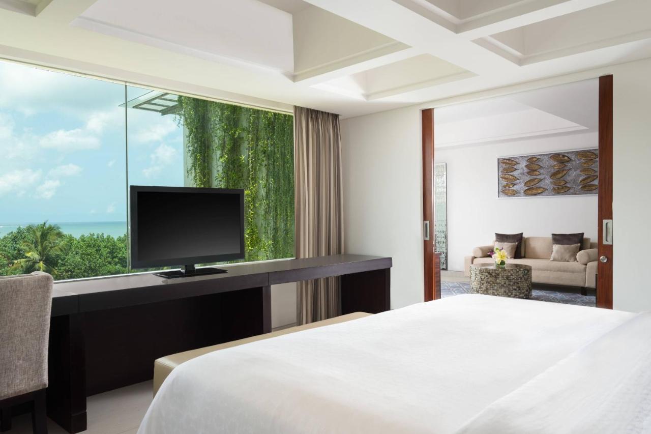 Sheraton Bali Kuta Resort Exteriör bild A bedroom at the hotel